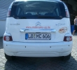 Fahrzeugbeschriftung, MobiCare, Heck.JPG